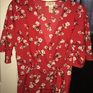 Red floral blouse